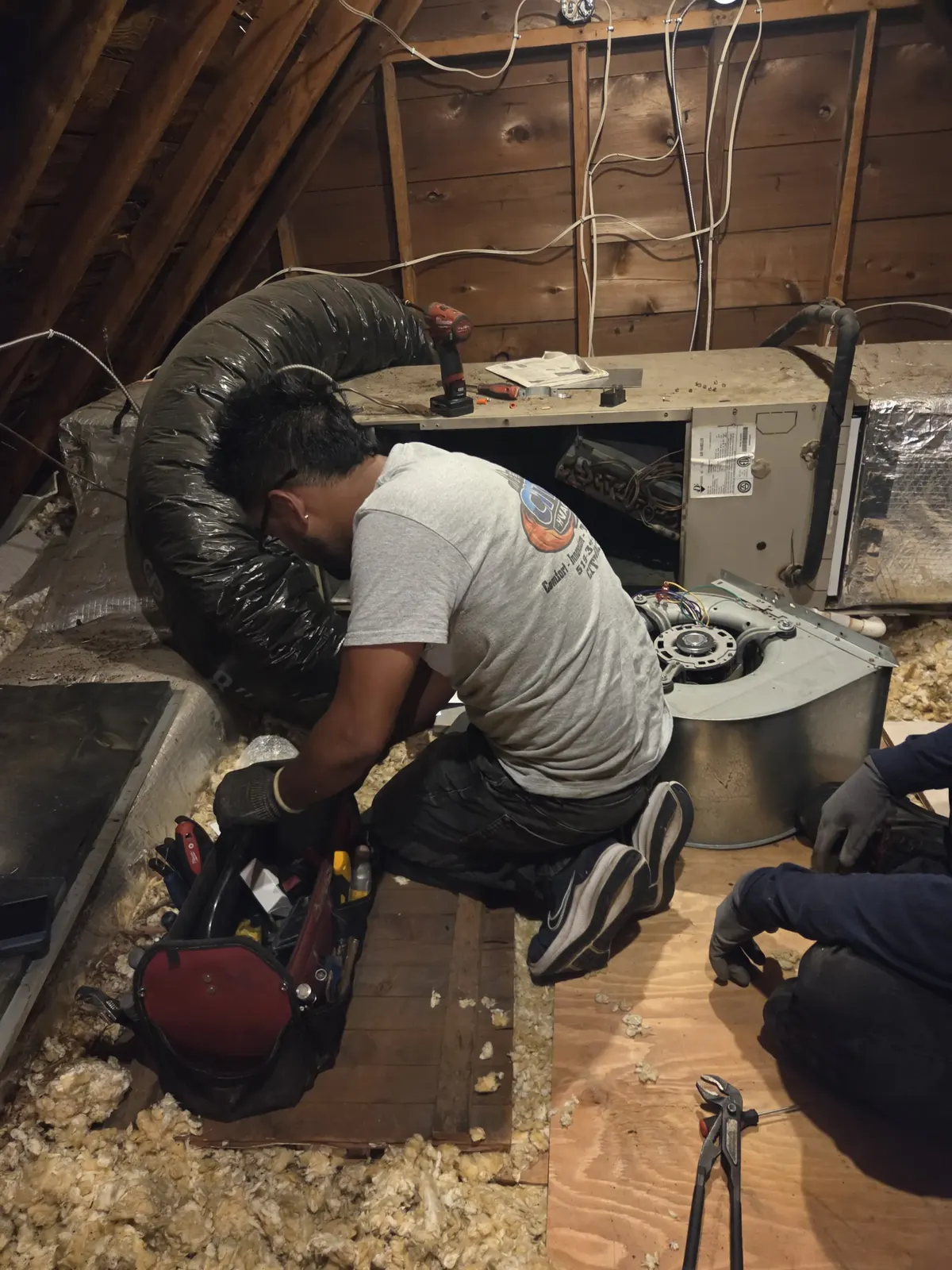 CITI HVAC two-technician team completing attic system repair — South Windsor ON