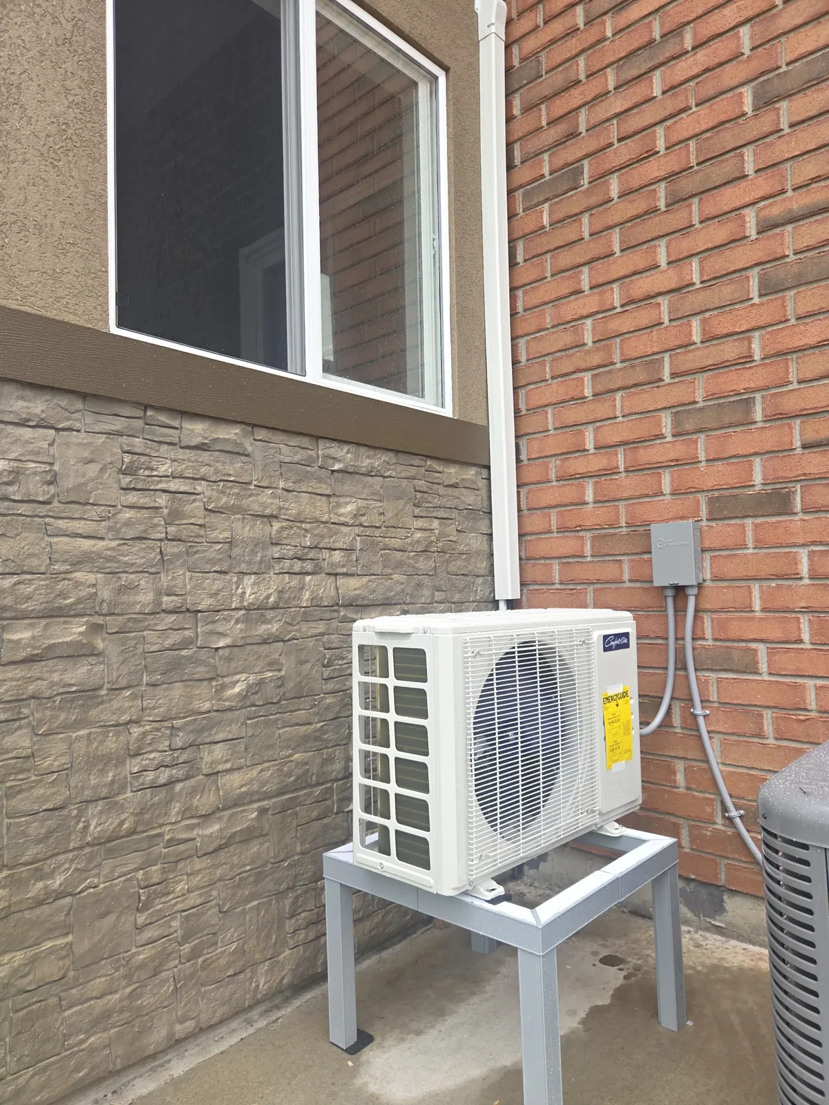 Completed ductless mini-split heat pump outdoor unit installation — South Windsor ON