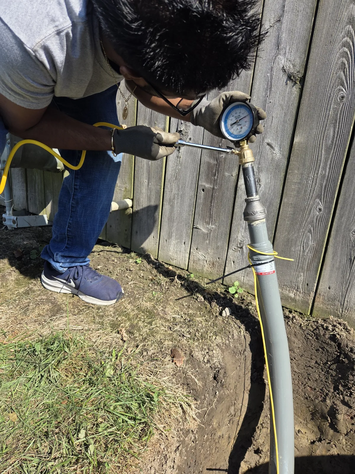 CITI HVAC technician pressure testing gas line with test gauge — Essex ON