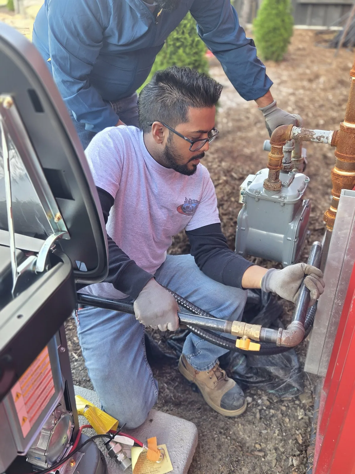 CITI HVAC technician connecting generator gas piping at the meter set — Essex ON