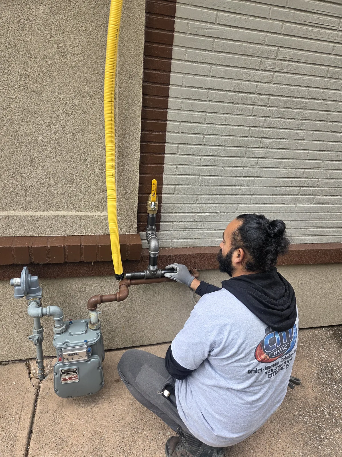 CITI HVAC technician installing gas tee and shutoff valve at the meter set — Tecumseh ON